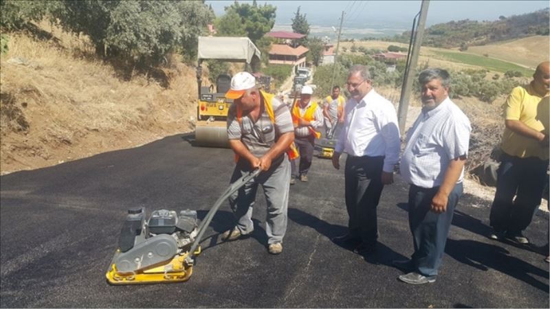 Asfalt ve yol çalışmasını inceledi