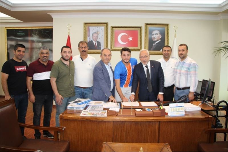 Tolga, sözleşme imzaladı